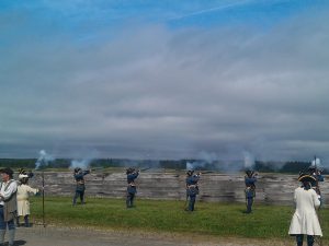 Soldiers firing at quay